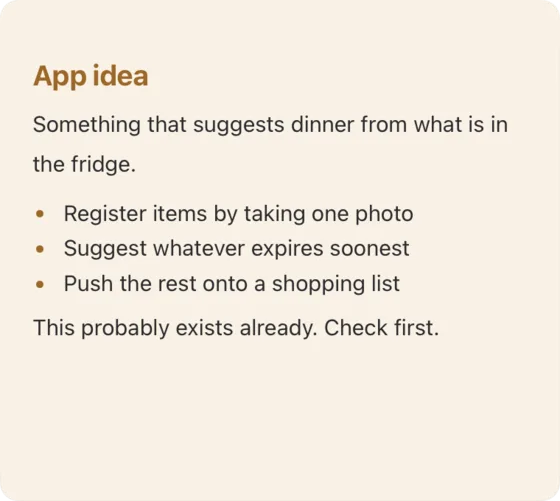 An orange sticky note holding an app idea